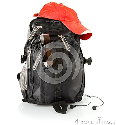 Black backpack with red cap and glasses Stock Photo
