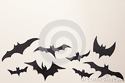 Black bats paper cut background. Stock Photo