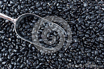 Black bean on background. top view. Black turtle beans are good for soup and stew. Fresh organic natural beans. Stock Photo