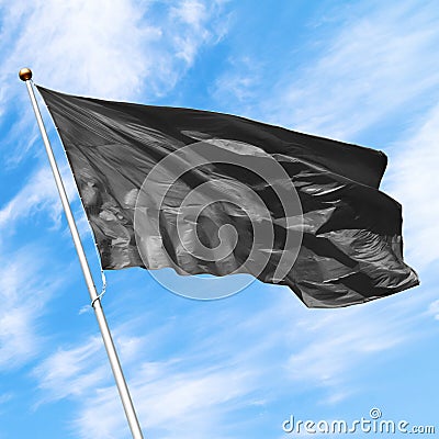 Black blank flag mockup on blue cloudy sky Stock Photo