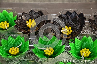 Black and Blue candle lotus flower for pray buddha culture , selective focus Stock Photo