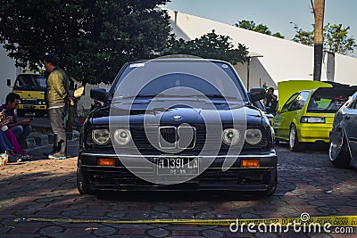 Black BMW 318i E30 sedan in retro car meet Editorial Stock Photo