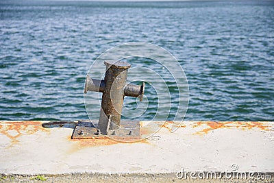 Black bollard for mooring Stock Photo