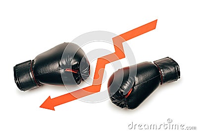 Black boxing gloves separated with downward arrow sign Stock Photo