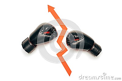 Black boxing gloves separated with growing arrow sign Stock Photo