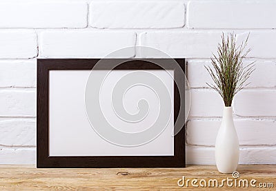 Black brown landscape frame mockup with dark grass in elegant v Stock Photo