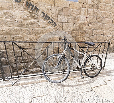 Bycycle chained in Jerusalem Editorial Stock Photo