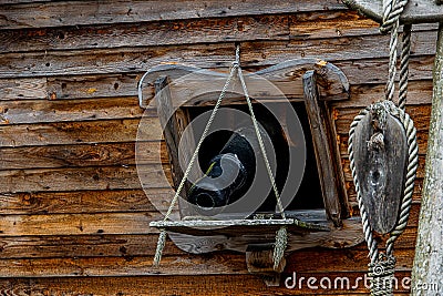 black cannon in the side of a wooden vintage warship background Stock Photo