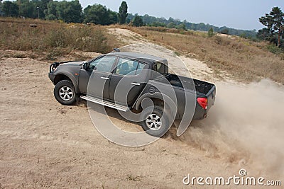 Black car 4wd on the road Stock Photo