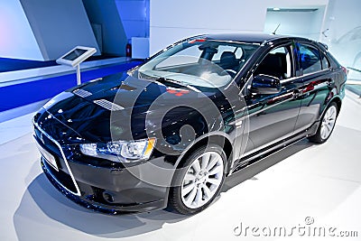 Black car Mitsubishi Lancer Editorial Stock Photo