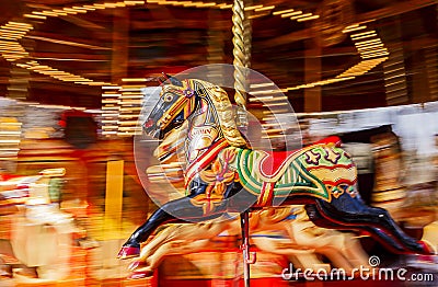 Black Carousel Horse Motion Blur Stock Photo