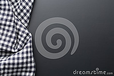 Black checkered napkin on table Stock Photo