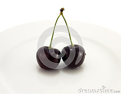 Black cherry on a plate Stock Photo