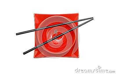 Black chopsticks on red bowl and square plate iso Stock Photo