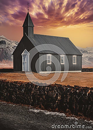 Black Church of Budir during an amazing red fire sunset, Iceland Stock Photo