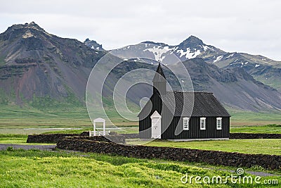 Black Church in the village of Budir, Iceland Stock Photo