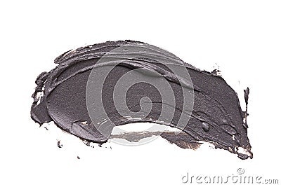 Black clay facial mask smear on white isolated background Stock Photo