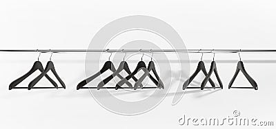 Black clothes hangers on white background Stock Photo