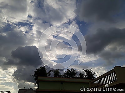 Black cloud flying in the blue sky Stock Photo