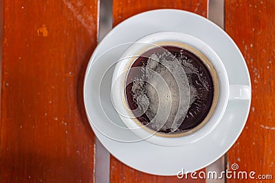 Black Coffee , Amaricano , White coffee cup , background wooden , Top view Stock Photo