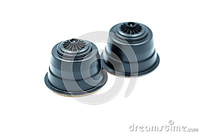 Black coffee capsules for an automatic coffee machine isolated on white. Stock Photo