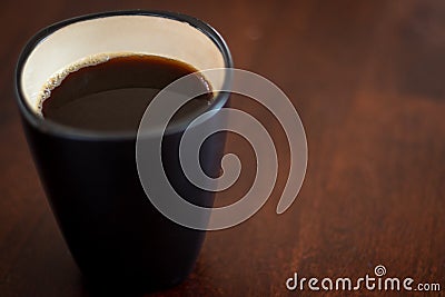Black coffee cup on a wooden table Stock Photo