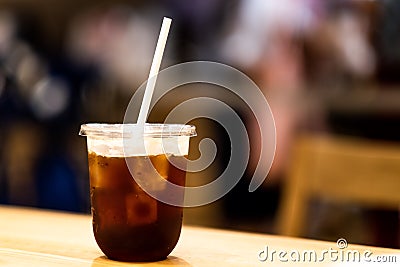 A black coffee on recycle glass and paper straw Stock Photo