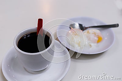 Black Coffee Traditional Singapore Breakfast called Kaya Toast Stock Photo