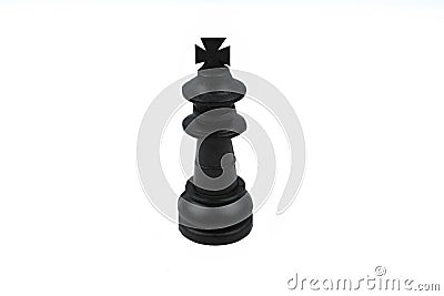 Black color king pawn placed in a middle of the white isolated background Stock Photo