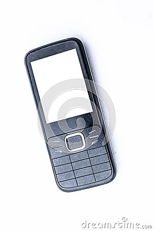 Black colored Mobile phone or cell phone or keypad cell phone or keypad mobile phone isolated on white. Stock Photo