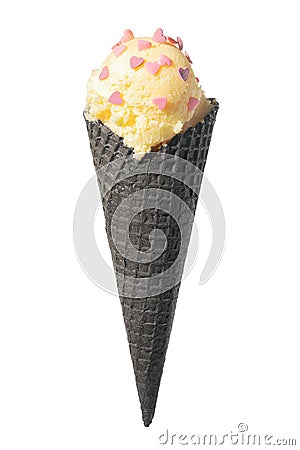 Black cone, waffle cup with ice cream decorated sweet hearts is Stock Photo