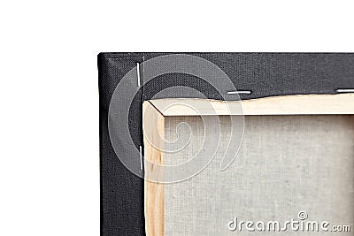 Black cotton canvas stretched on wooden subframe on white. View from the back Stock Photo