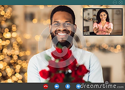 Black couple having romantic online date, celebrating anniversary Stock Photo