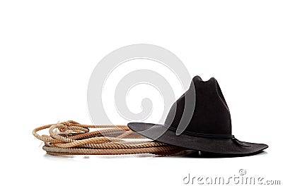 Black cowboy hat and lasso on white Stock Photo