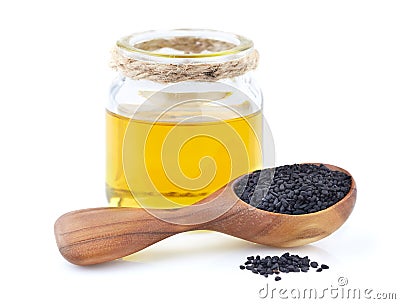 Black cumin oil with seeds Stock Photo