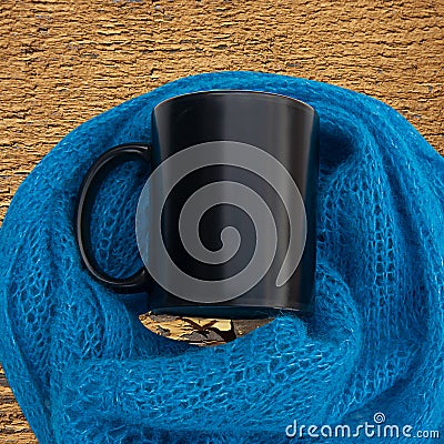Black cup with lace blue scarf Stock Photo