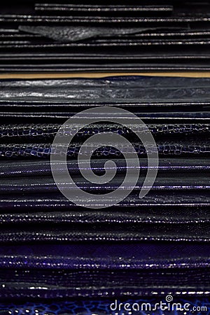 Black and dark blue reptile leather samples collection texture background Stock Photo