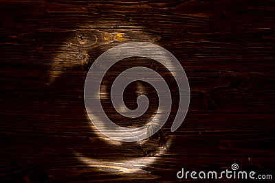 Black or dark laughing pumpkin Halloween Jack-o'-lantern of shadow on a dark wooden background. Jackolantern Stock Photo