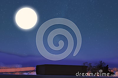 A demon cyclist escape out of the dark book under the bright light of the full moon with the blue mountains in the background. Fa Stock Photo