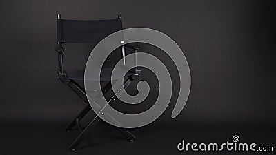 Black director chair use in video production , movie ,film, cinema industry on black background Stock Photo