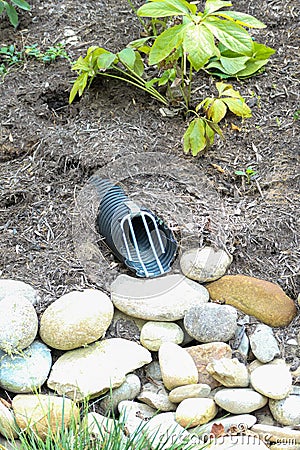 A drain in a landscaped hill Stock Photo