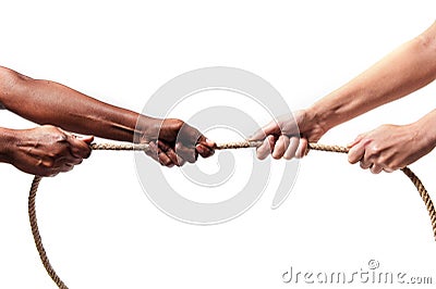 Black ethnicity arms with hands pulling rope against white Caucasian race person in stop racism and xenophobia concept Stock Photo