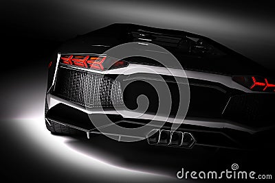 Black fast sports car in spotlight, black background. Shiny, new, luxurious. Stock Photo