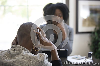 Black Female Client Angry at Tax CPA Accountant Stock Photo