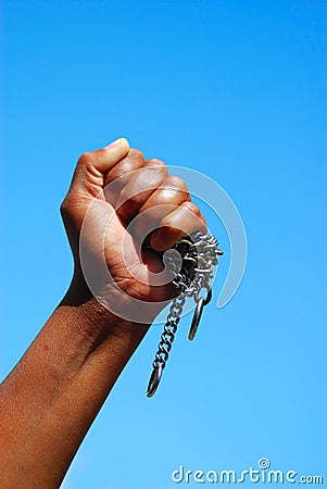 Black fist with chain Stock Photo