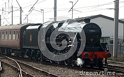 Black five steam train arriving at Carnforth Editorial Stock Photo