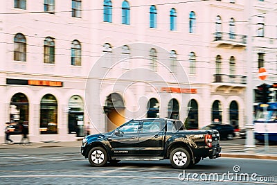 Black Ford Ranger Wildtrak Fast Drive In Summer City Street. The Third-generation Ford Ranger Editorial Stock Photo