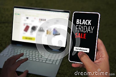 Black friday sale. special offer discount text on mobile phone screen message. Get promotional code for discounted purchases Stock Photo