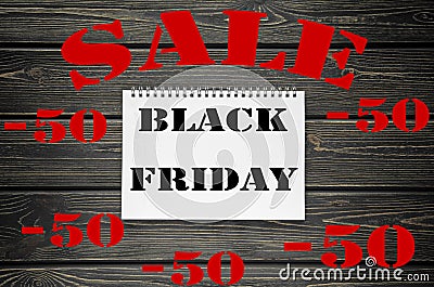 Black Friday sales Advertising Poster on Black Wooden background Stock Photo