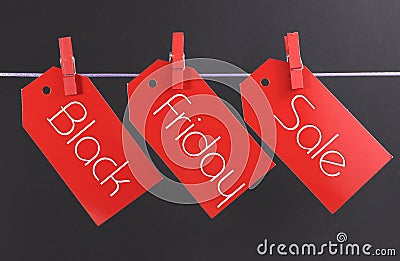 Black Friday shopping sale concept with message written across red ticket sale tags Stock Photo